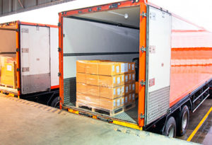 Logistics Truck at Depot With Boxes